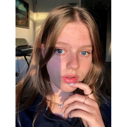 Vage glimlach